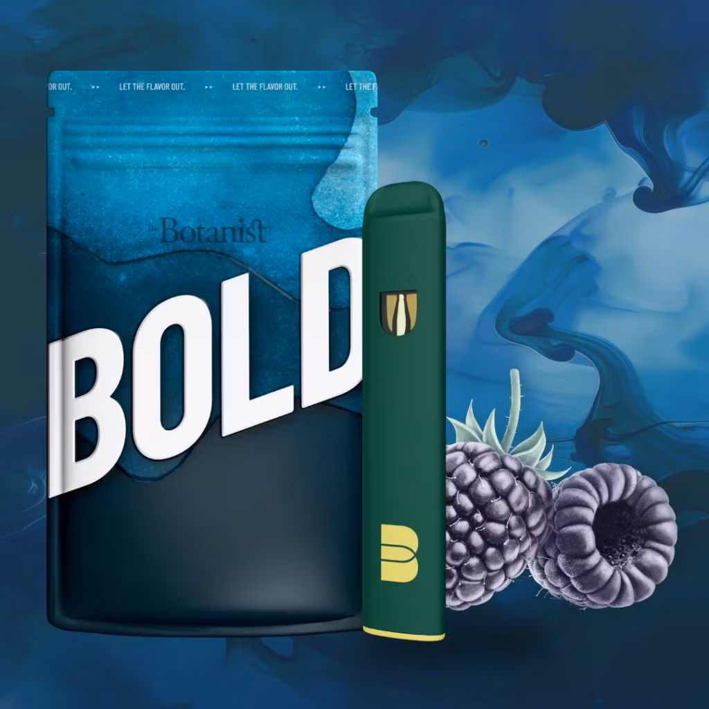 The Botanist Blue Razzberry cannabis vape pen next to packaging and blackberries.