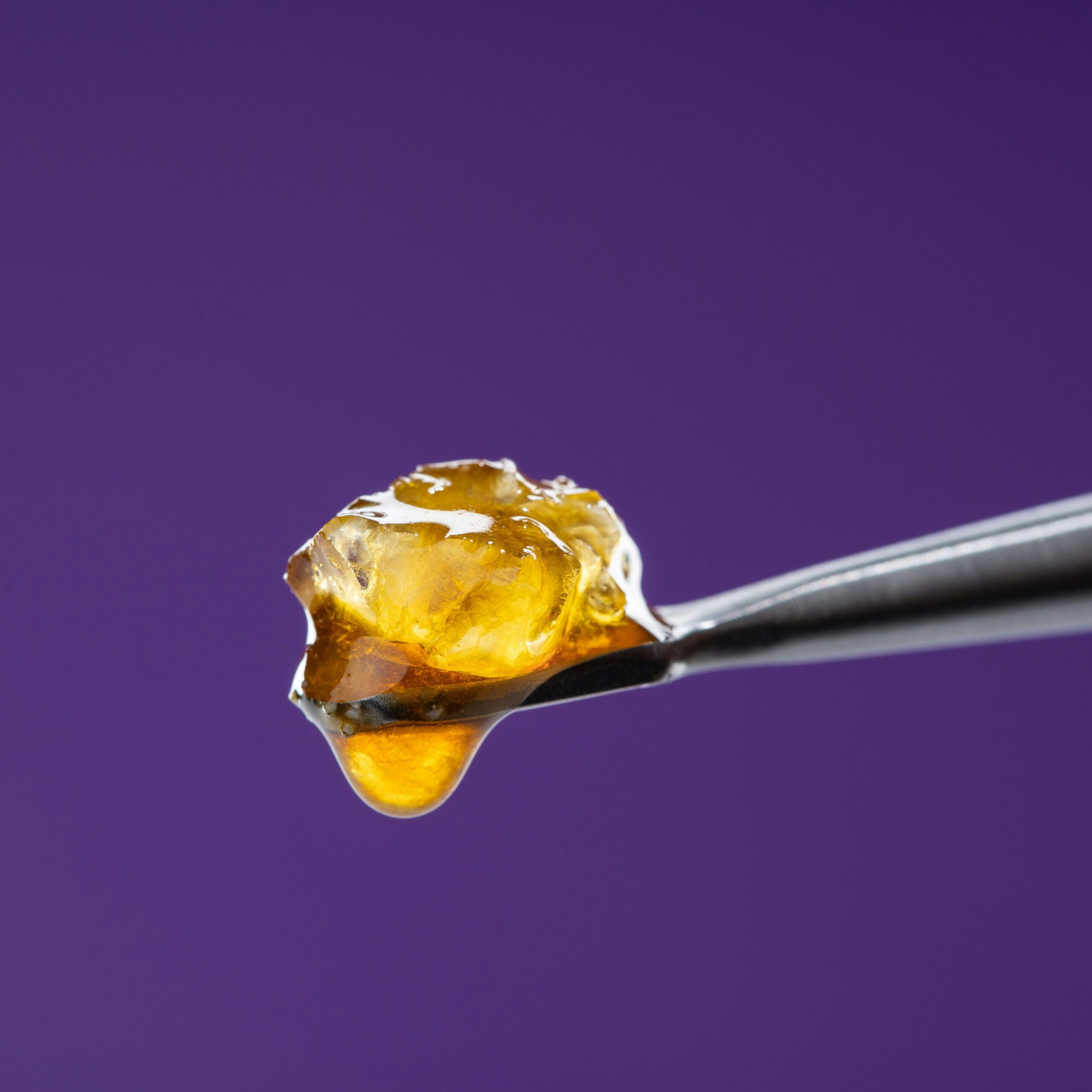THC live sauce on a metal utensil.