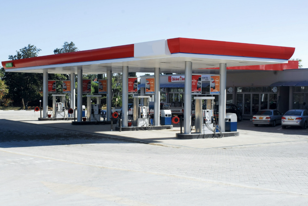 Gas station with fuel pumps and an attached convenience store, representing the type of unlicensed retail location where delta-8 and hemp THC products can no longer be legally sold in New Jersey as of April 2026